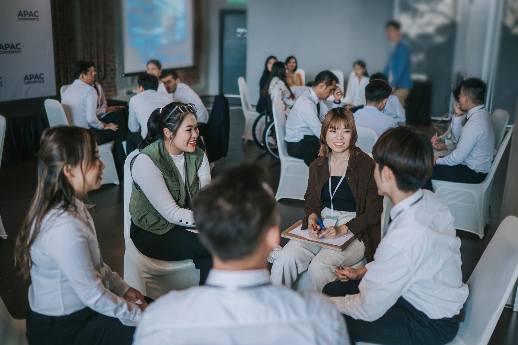 Workshop participants collaborating during a business training session